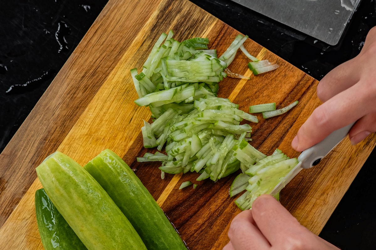 Vibrant vegetable stir-fry in a wok with sesame garnish
